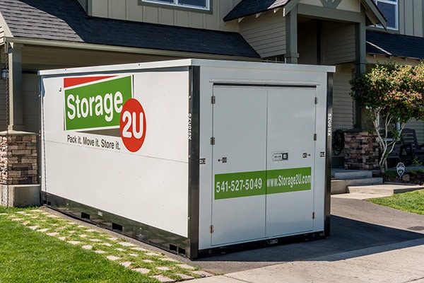 A Storage2U Container sitting in a driveway